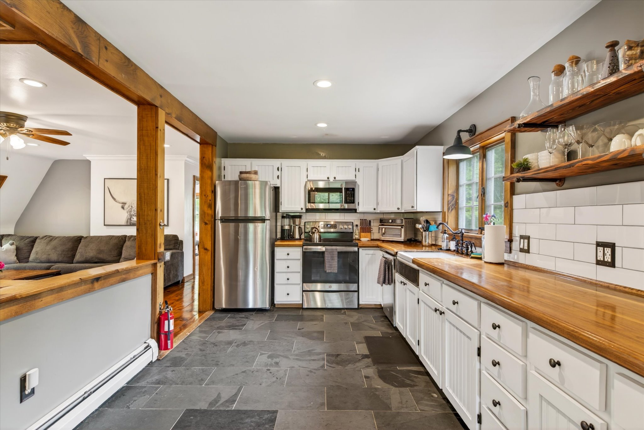 Kitchen wide view with open shelves — Slippery Slope Chalet